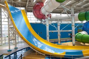 a large water slide in a water park at Spa World HOTEL&RESORT in Osaka