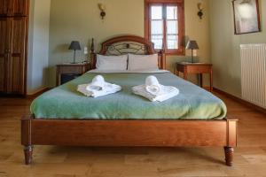 Postel nebo postele na pokoji v ubytování Papigiotis Hotel