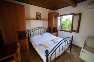 Postel nebo postele na pokoji v ubytování Residence New Paradise