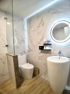Koupelna v ubytování Wunsin Motel + 37 fotografií