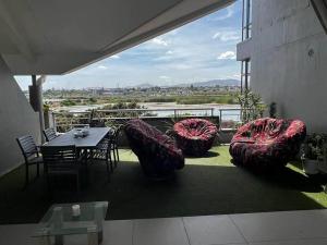 Χώρος καθιστικού στο Dolphin Africa Apartment