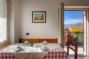 A bed or beds in a room at Agritur Cristina