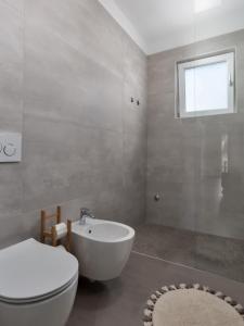 Koupelna v ubytování Luxury Apartment Vabriga + 27 fotografií