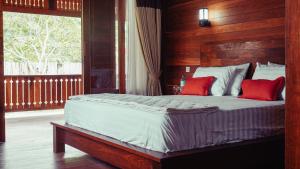 Katil atau katil-katil dalam bilik di Madaira Villa Senggigi