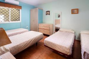 Posteľ alebo postele v izbe v ubytovaní Villa Pepa