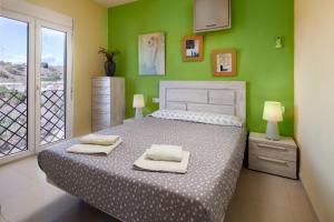 Postel nebo postele na pokoji v ubytování Villa Pepa + 27 fotografií