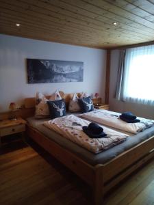 Letto o letti in una camera di Panoramahof Gupf