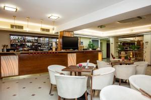 Lounge nebo bar v ubytování Hotel Boss