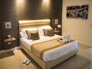 Postel nebo postele na pokoji v ubytování Hotel San Pietro