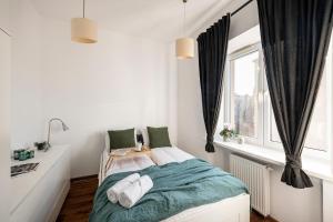 Posteľ alebo postele v izbe v ubytovaní ShortStayPoland Długosza (B15)