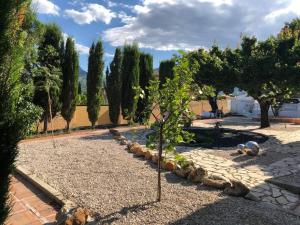 Vonkajšia záhrada v ubytovaní 'Coll de Rates' Beautiful 1-Bed Apartment