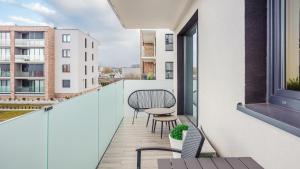 Balkón alebo terasa v ubytovaní Apartament Grey 10 C Perłowa Przystań - Holiday City + 20 fotografií