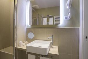 A bathroom at Colosseo Prestige Rooms