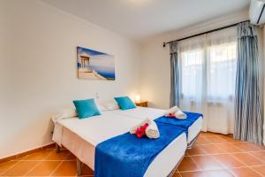 Postel nebo postele na pokoji v ubytování Ideal Property Mallorca - Can Jaume