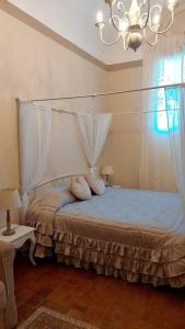 Кровать или кровати в номере Casa Masoli