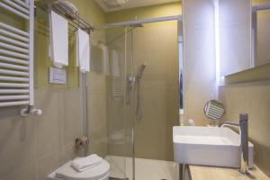 A bathroom at Colosseo Prestige Rooms
