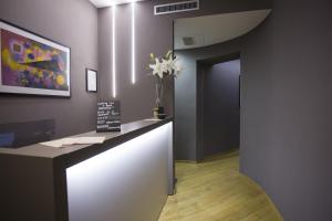 Kép Colosseo Prestige Rooms szállásáról Rómában a galériában