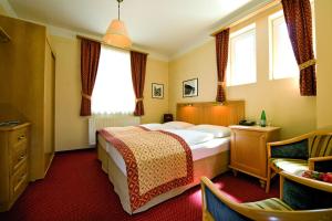 Postel nebo postele na pokoji v ubytování Hotel Gisela + 20 fotografií
