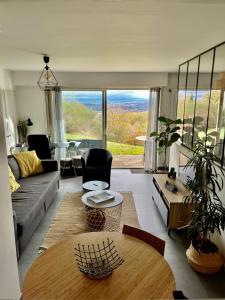 Posedenie v ubytovaní Chez Isa, loft 55m2, jardin, vue, parking, entrée autonome