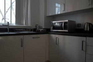 Kuchyň nebo kuchyňský kout v ubytování East Central London - Sleeps 6 - Pet Friendly