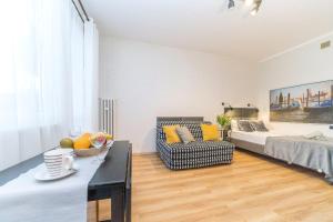 Posteľ alebo postele v izbe v ubytovaní Apartamenty Przytulne z balkonem, 150m od dworca Gdańsk Główny