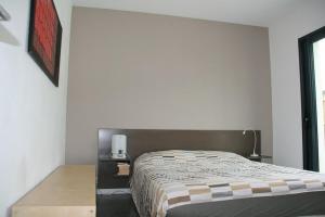 a bedroom with a bed and a window and a bed sidx sidx sidx at Villa Alberes Sorede 7 km of beaches in Sorède +39 photos