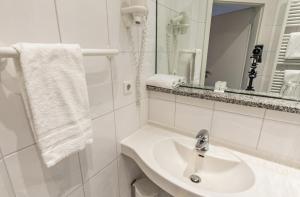 Koupelna v ubytování Hotel-Gasthof zum Ritter