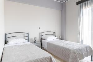 Posteľ alebo postele v izbe v ubytovaní Villa Archodia - With Private Pool + 37 fotografií