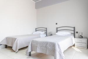 Posteľ alebo postele v izbe v ubytovaní Villa Archodia - With Private Pool