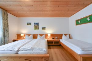 Postel nebo postele na pokoji v ubytování Landhaus Grobert
