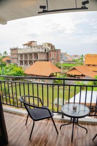 Balkón nebo terasa v ubytování Berawa Homestay + 6 fotografií