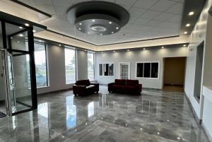 The lobby or reception area at Travelodge by Wyndham Regina