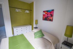 Кровать или кровати в номере Maisons Du Lac
