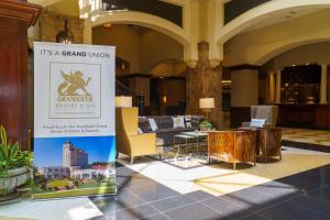 a lobby with a grand living room with a couch at Grandover Resort & Spa, a Wyndham Grand Hotel in Greensboro