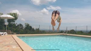 Poolen vid eller i närheten av Casa Aiva & il Ciabutin, in collina tra i vigneti