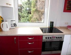 Η κουζίνα ή μικρή κουζίνα στο EIC4 Bungalow Bullwinkel +3 φωτογραφίες
