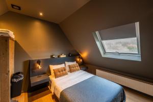 Postel nebo postele na pokoji v ubytování M-otel E40