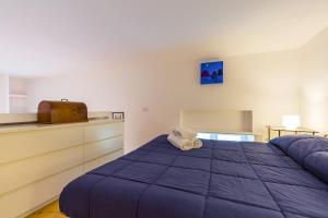Letto o letti in una camera di Grifeo - Quiet and Relaxing Flat on Panoramic Route