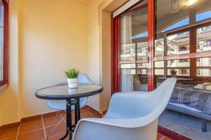 Posezení v ubytování 797 Holiday Rentals -Lujoso Atico duplex en el centro de Benalmadena