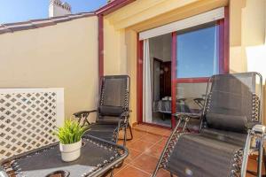 Posezení v ubytování 797 Holiday Rentals -Lujoso Atico duplex en el centro de Benalmadena