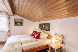 Posteľ alebo postele v izbe v ubytovaní Landhaus Aggenstein