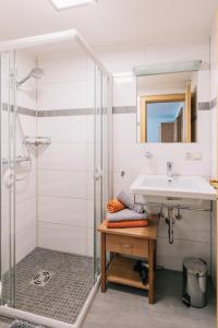 Koupelna v ubytování Landhaus Aggenstein + 37 fotografií