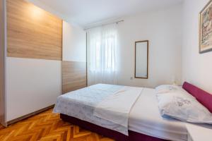 Posteľ alebo postele v izbe v ubytovaní ZVEK