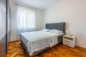 Posteľ alebo postele v izbe v ubytovaní ZVEK
