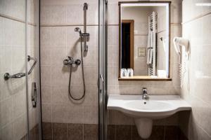 Kúpeľňa v ubytovaní Wellness Hotel Gendorf
