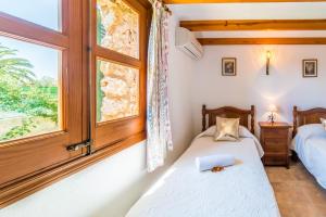 Posteľ alebo postele v izbe v ubytovaní Ideal Property Mallorca - Moli