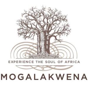 a logo for morgalaxyagency with two trees at Mogalakwena River Lodge in Alldays