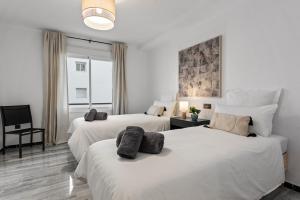 Łóżko lub łóżka w pokoju w obiekcie Modern Apartment - 2 Bedrooms, Beachside - Puerto Banús