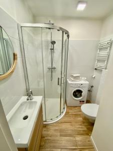 Kúpeľňa v ubytovaní Apartament Poznańska24 + 11 fotografií