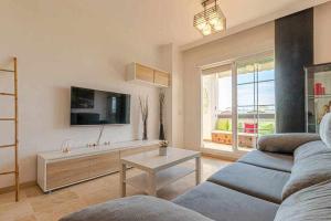 Posezení v ubytování 797 HOLIDAY RENTALS - Precioso apartamento con vistas a Arenal golf
